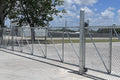 Commercial cantilever chain link gate — heavy-duty galvanized steel frame, no ground track required | GateBound