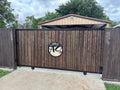 Flat top steel driveway gate installed at residential property — powder coated flat black, operator-ready | GateBound